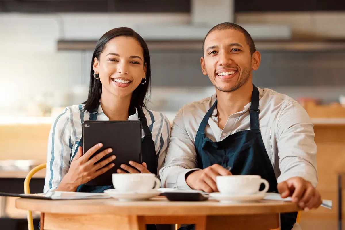 two-restaurant-workers-planning
