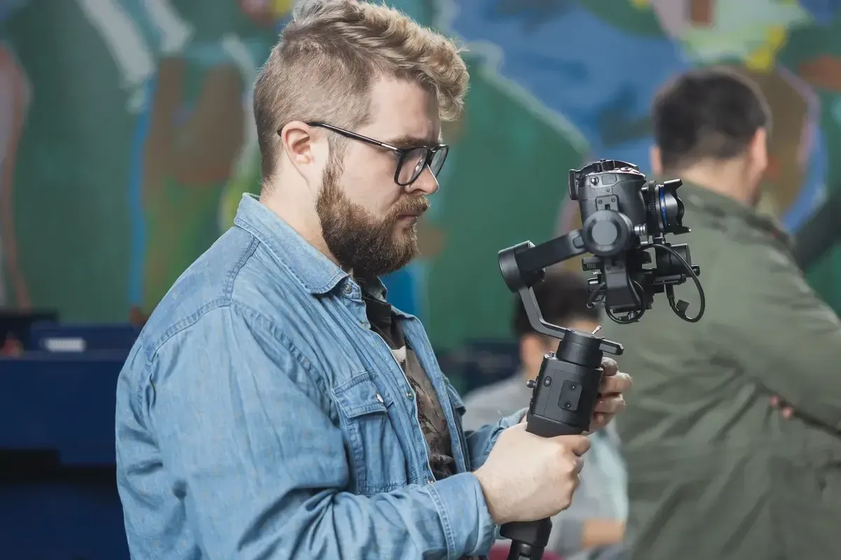 man-videomaker-works-on-news