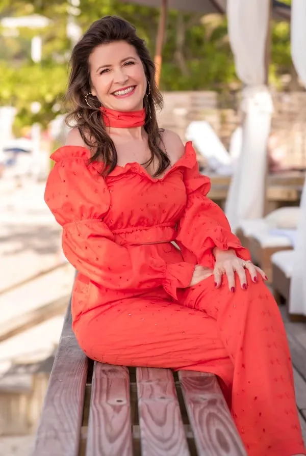 Olivia Lobell Orange Seated