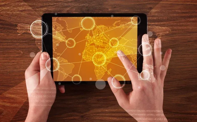 caucasian-business-hands-holding-tablet