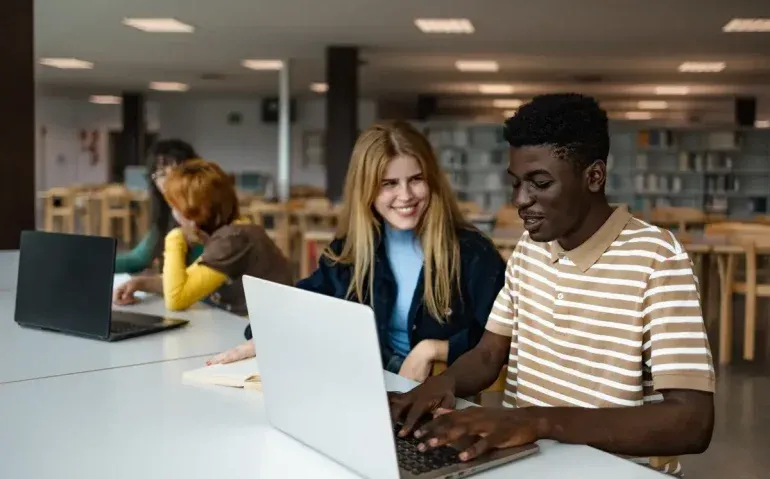 young-people-studying-together-in-university-libra