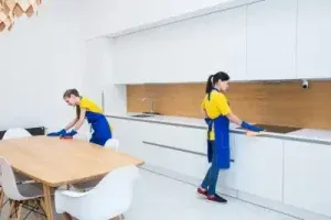cleaning service , clean4u cleaners works in the kitchen