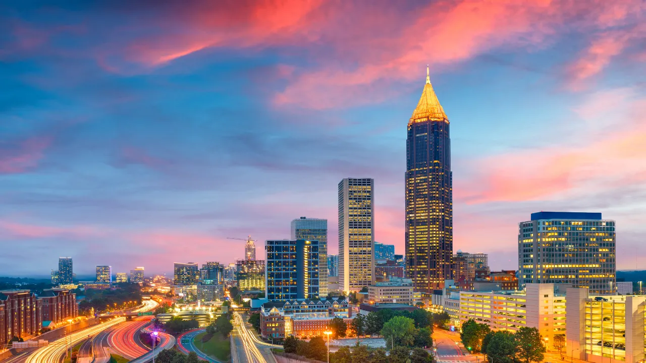 relocating to Atlanta skyline view with moving family
