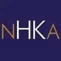 Logo with the letters "NHKA" in white and brown on a dark blue background.