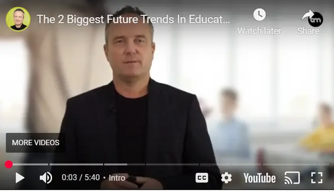 Thumbnail of a man presenting on future trends in education, with blurred classroom background. Rethinking education focus.