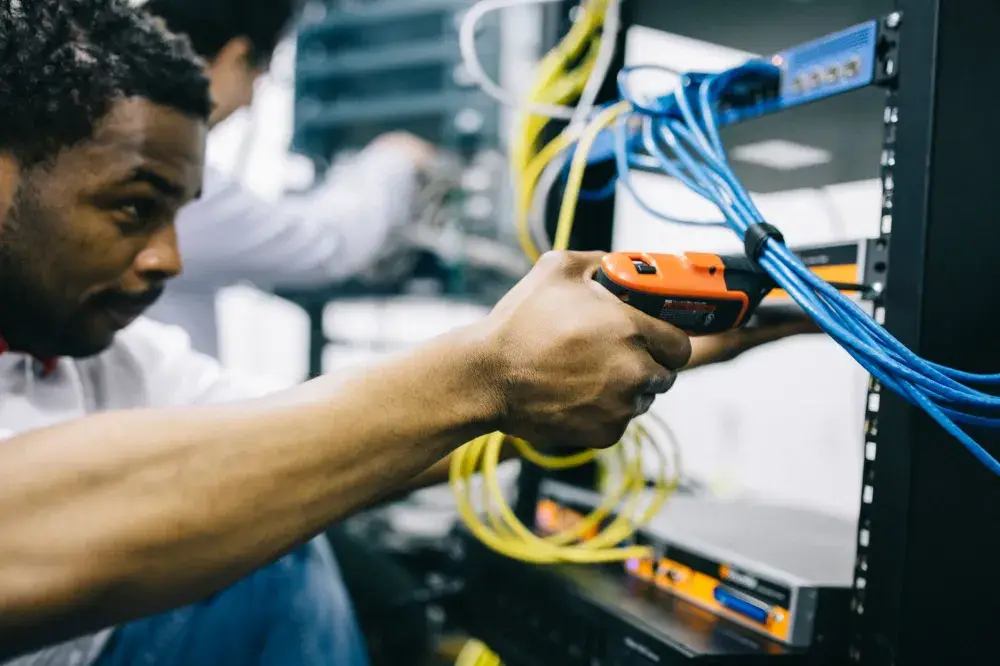 IT engineer configuring a Fortinet FortiGate firewall for a Dubai business office