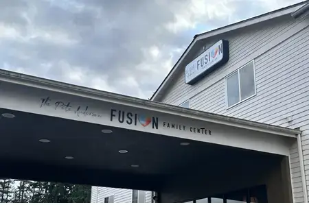 Entrance to The Pete Anderson FUSION Family Center on a cloudy day.