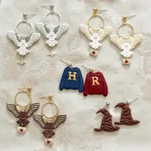 Handmade Harry Potter earrings: Hedwig owls, Weasley sweaters, sorting hats.