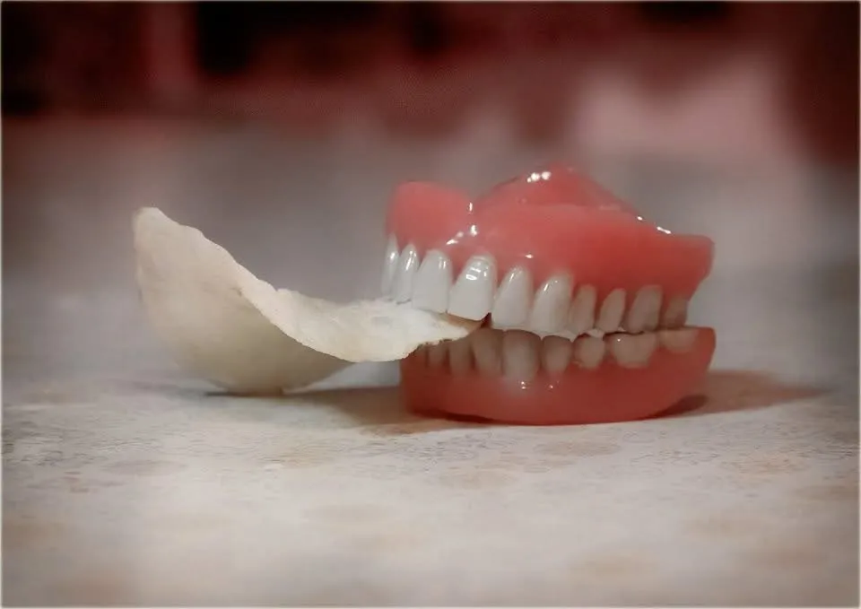 Flexible partial denture with pink gum-colored base