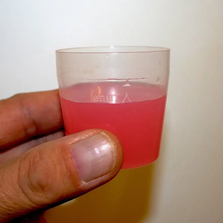 Mouthwash being poured