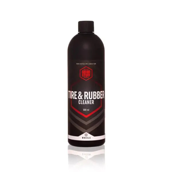 A black 500 ml bottle of Good Stuff Tire & Rubber Cleaner, a trusted name in wheel care, with a red and white label stands upright on a white background.