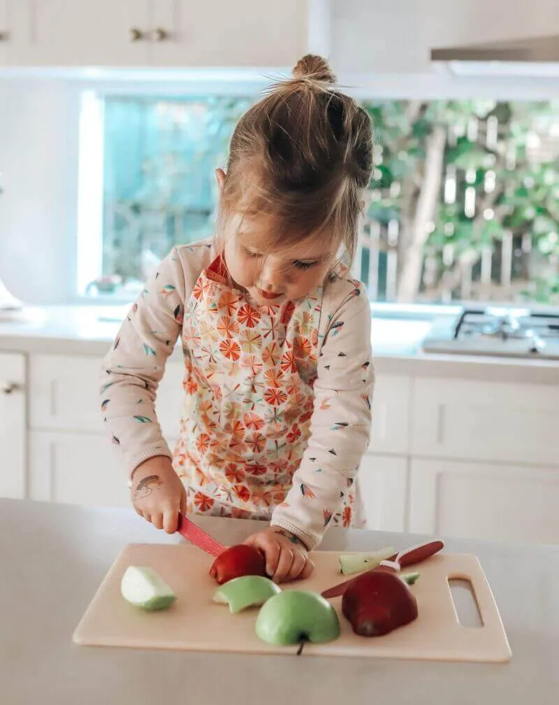 Child preparing food with a Dusty Pink KiddiKutter