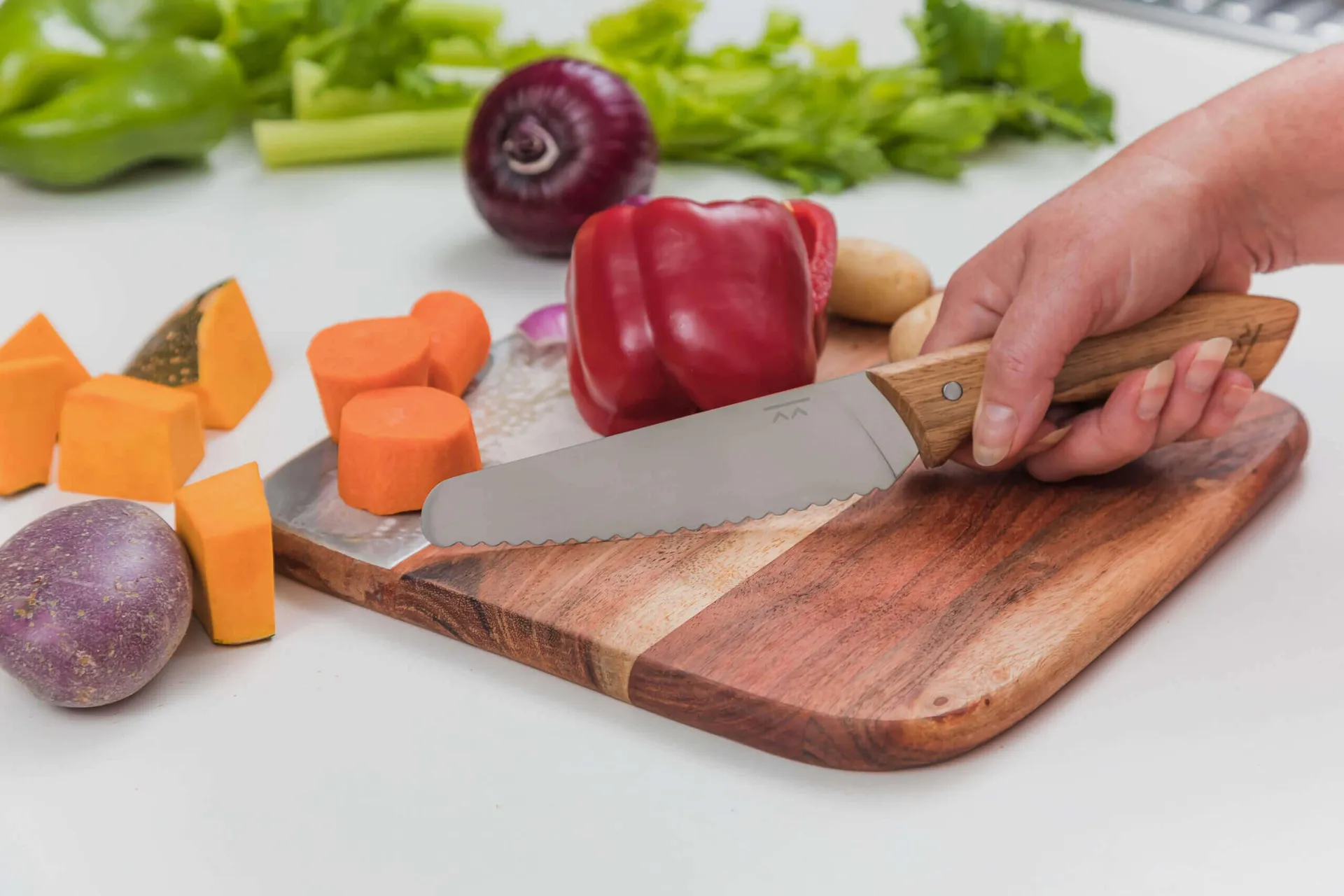 KandoKutter adult safe knife cutting vegetables