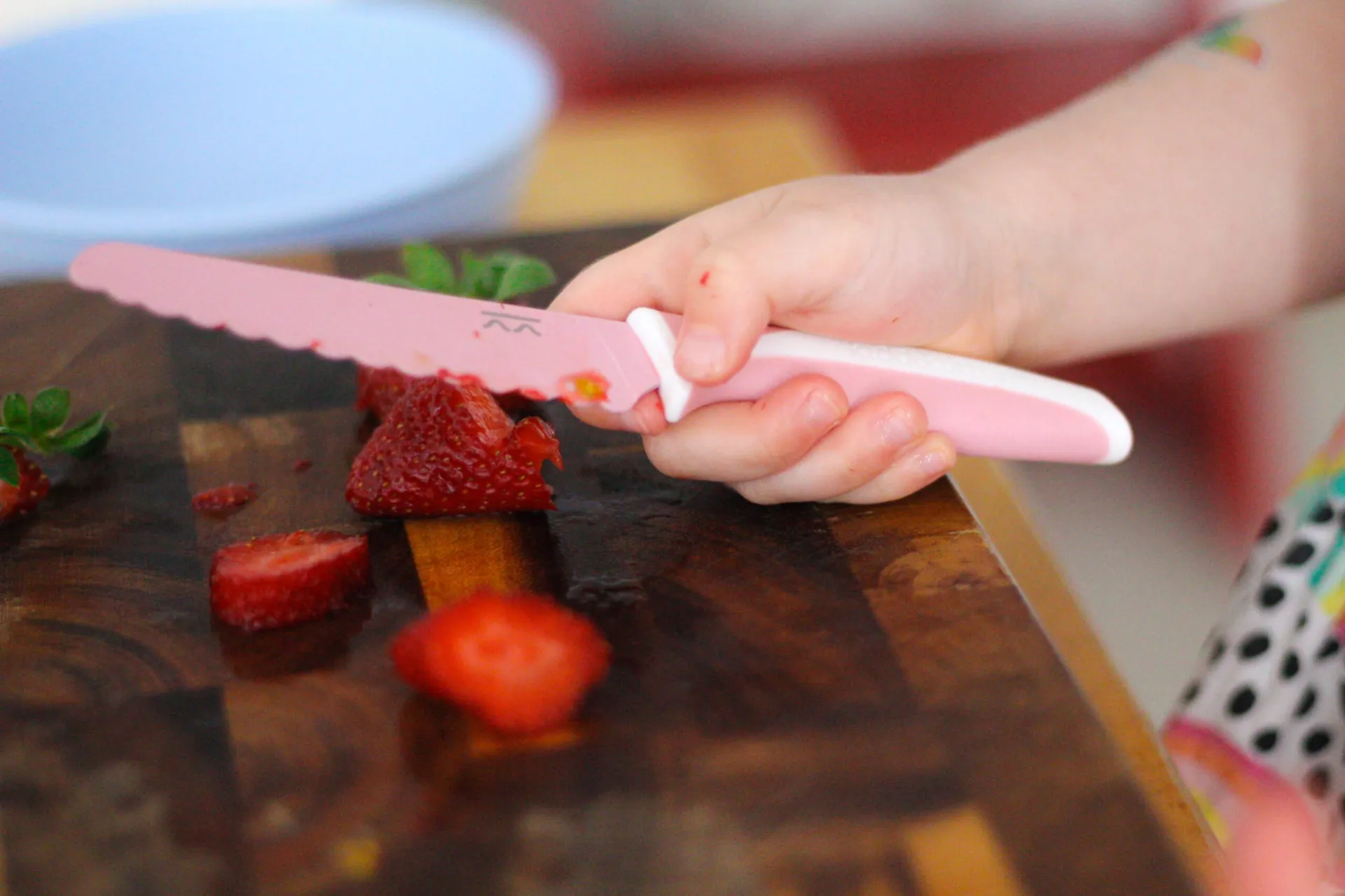 Blush KiddiKutter slicing strawberries