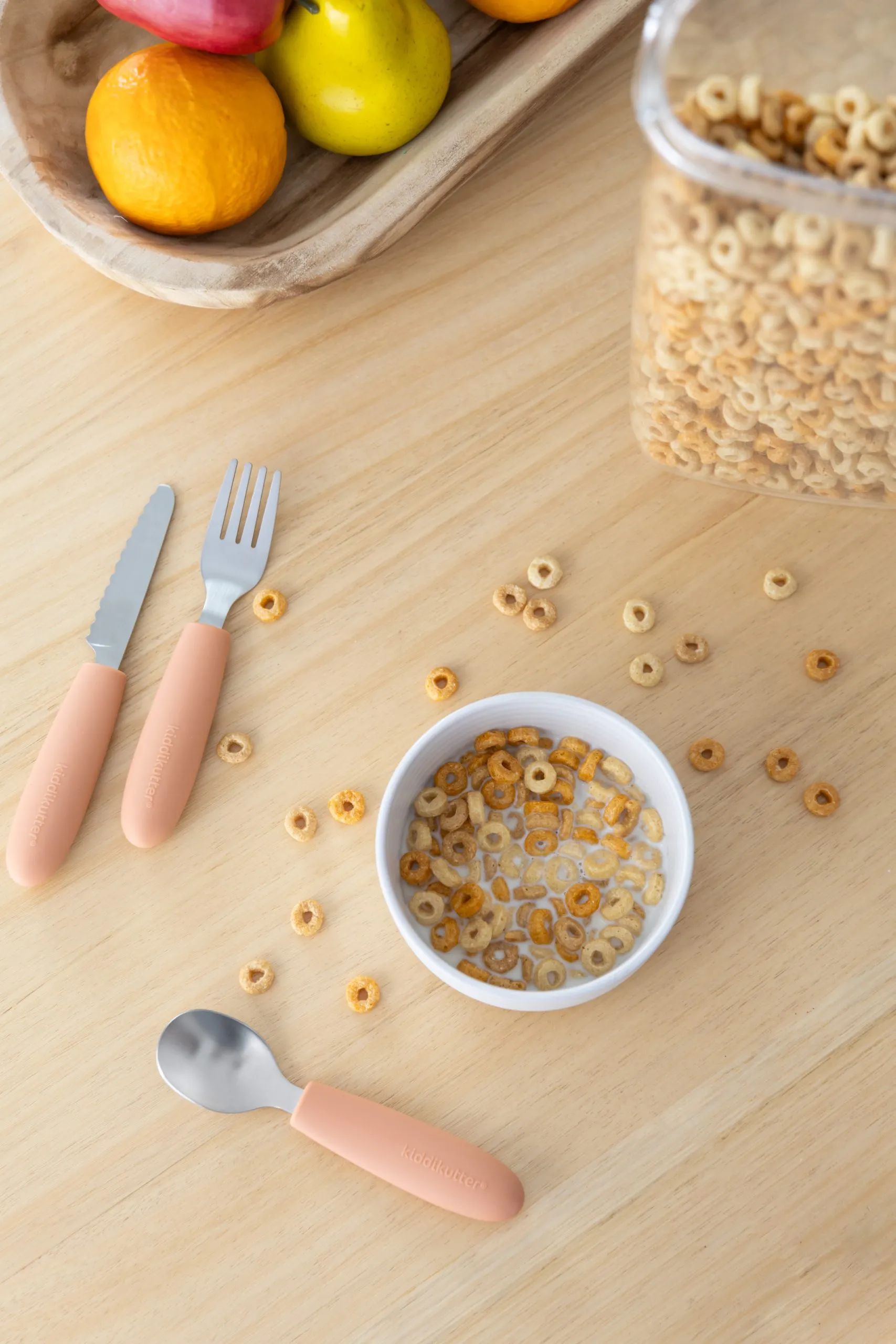 Terracotta kids spoon with a breakfast bowl