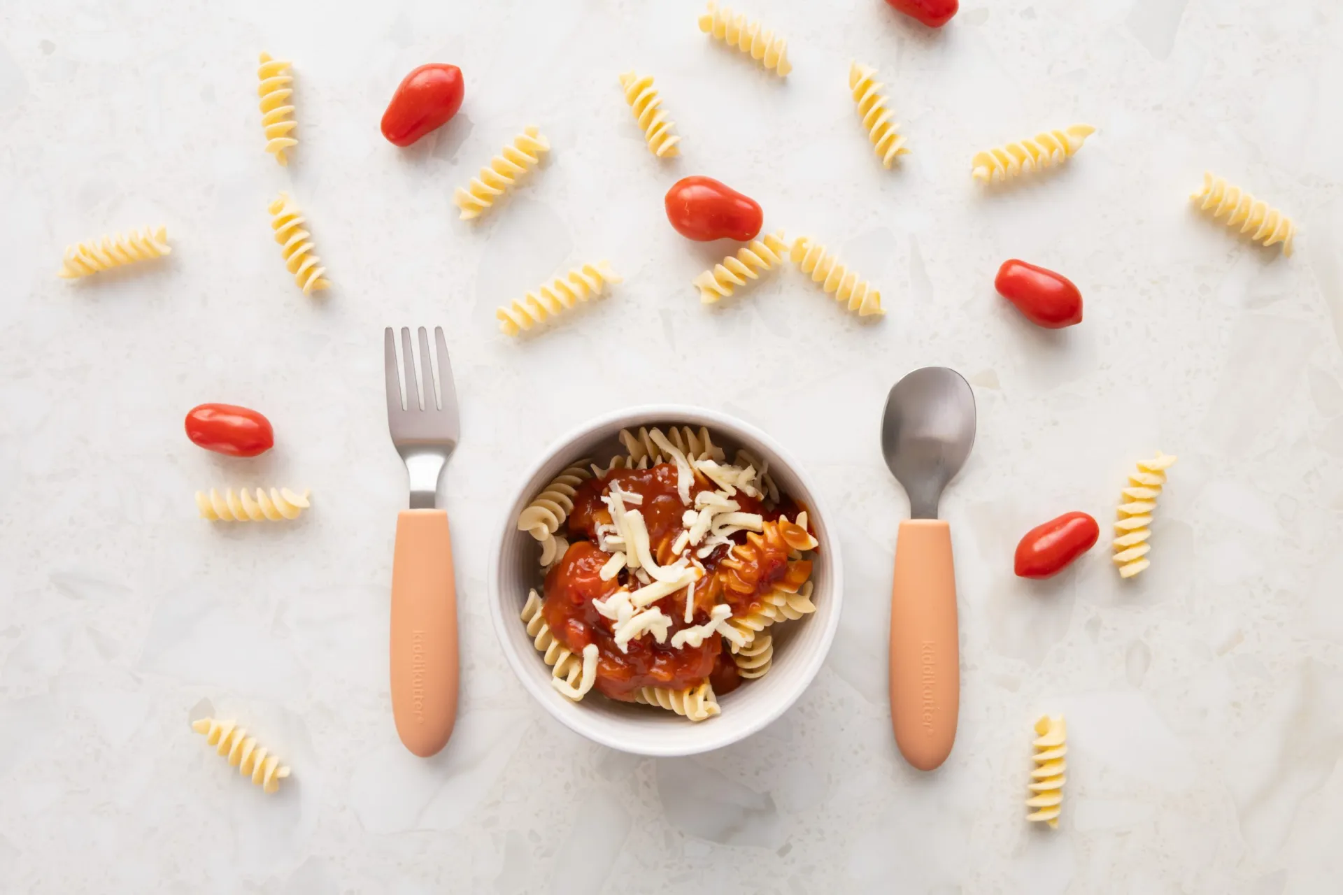 Terracotta kids cutlery with pasta