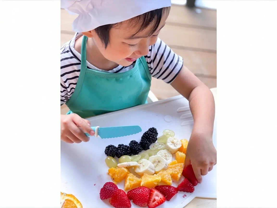 Child making a fruit plate with a Frozen Blue KiddiKutter