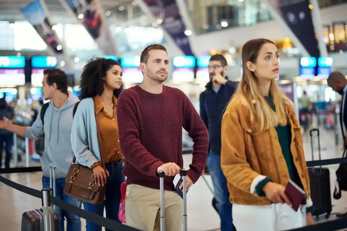 travel-queue-and-wait-with-man-in-airport