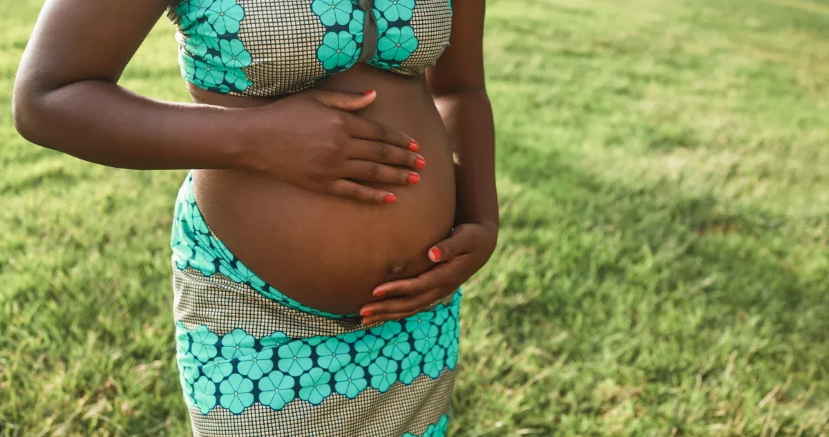 expecting-mother-rests-hands