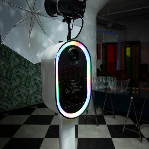 Video Confessional Booth - Lucky Frog Photo Booth | Corporate Event Rentals Video booth scaled A view of a photo booth, seen at a local party.
