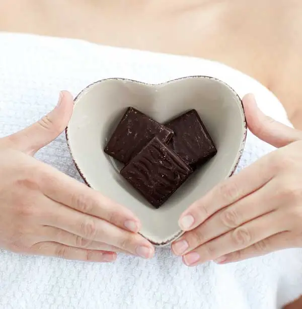 A bowl of chocolate in the shape of a heart
