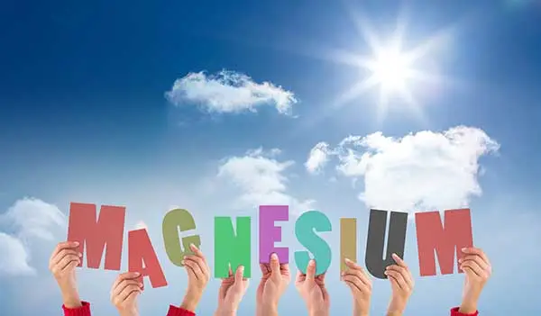 The letters MAGNESIUM held in the air
