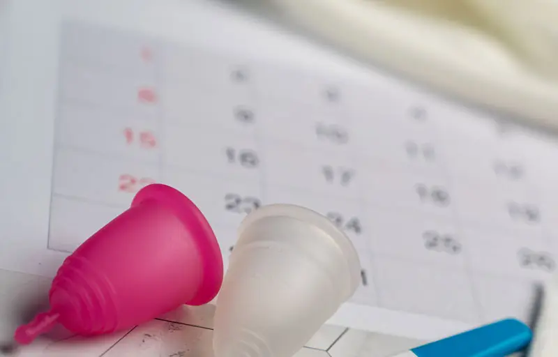 A menstrual cup and period calendar