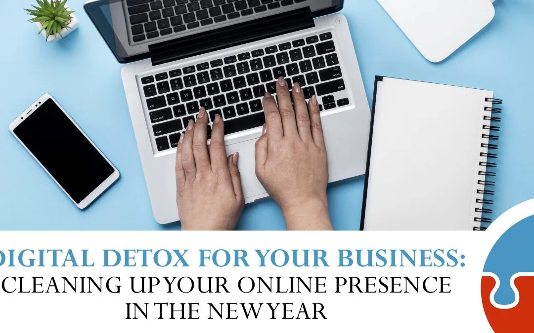 Hands typing on a laptop near a smartphone, notebook, and potted plant with text: "Digital Detox for Your Business: Cleaning up your online presence in the new year.