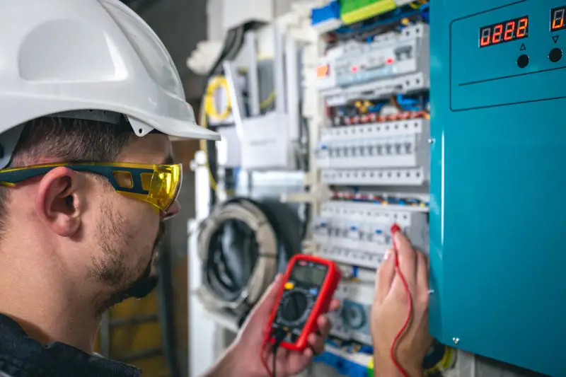 man-electrical-technician-working-switchboard-with-fuses Jack, licensed electrician and owner of Pro Electric Services in Glendora, CA