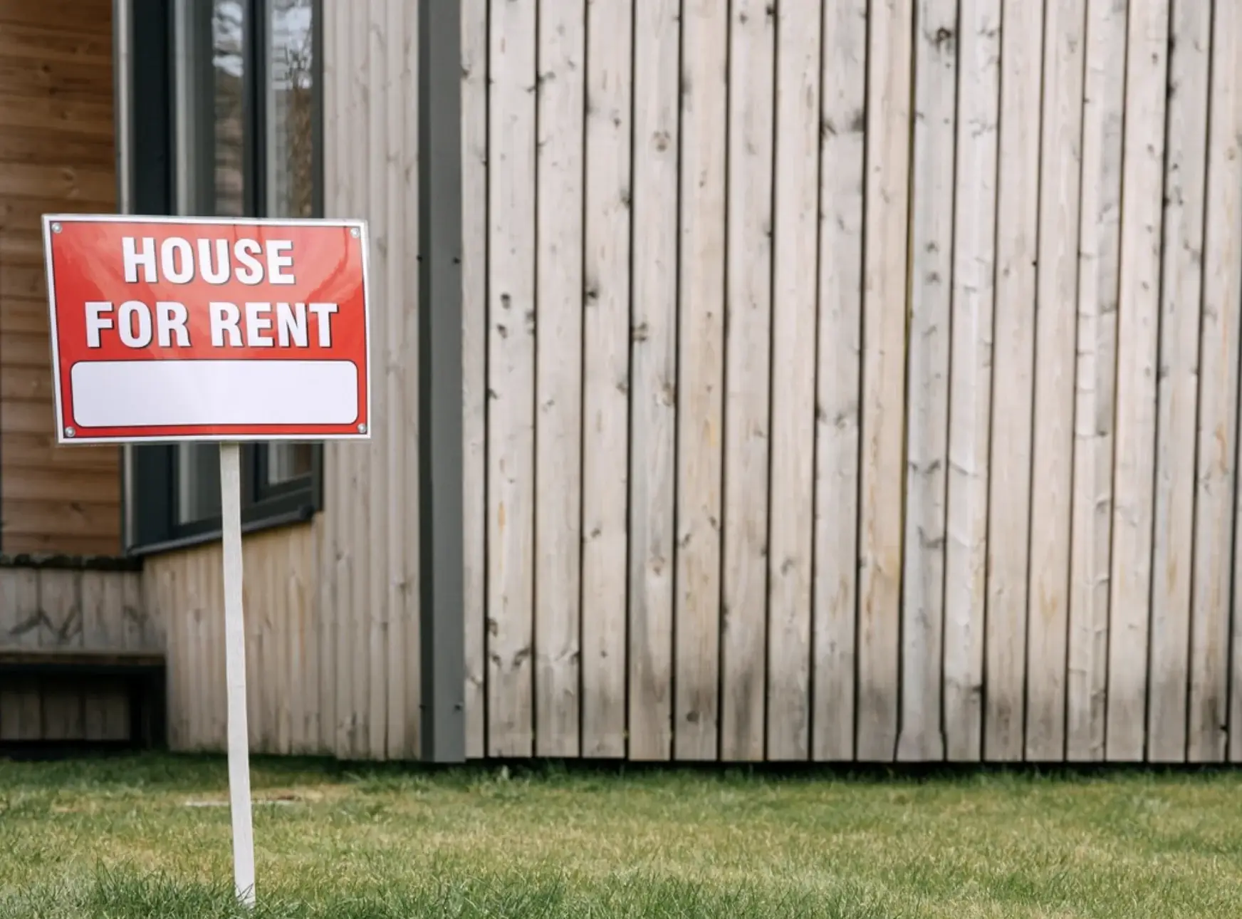 To Let sign outside house