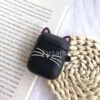 Black bearded cat