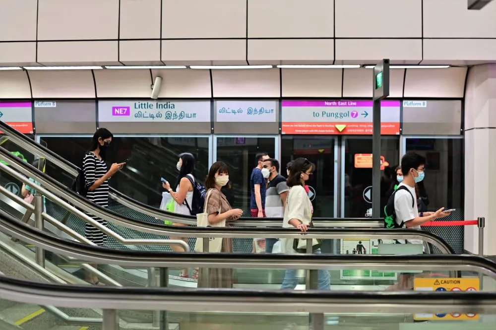 Bus & Train Fares Rise Up to 13 Cents from Dec 26 4 Passengers seated inside a Singapore MRT train carriage during morning peak hour