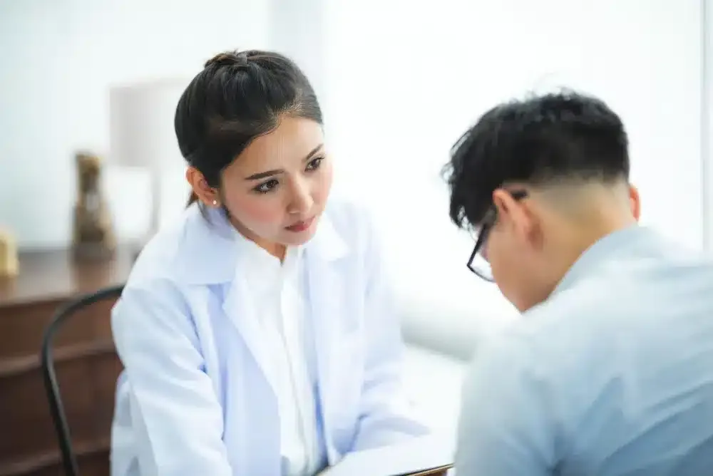 Botox for Chronic Migraines in Grand Prairie, TX | Same-Week Consults 1 Pain management doctor reviewing chronic migraine symptoms with patient during consultation
