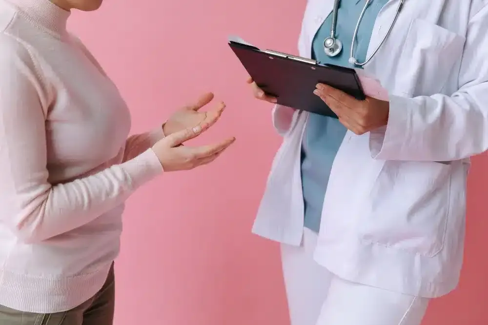 Facet Joint Injection in Plano, TX | Non-Surgical Options 1 Pain management doctor consulting a patient about facet joint arthritis treatment options