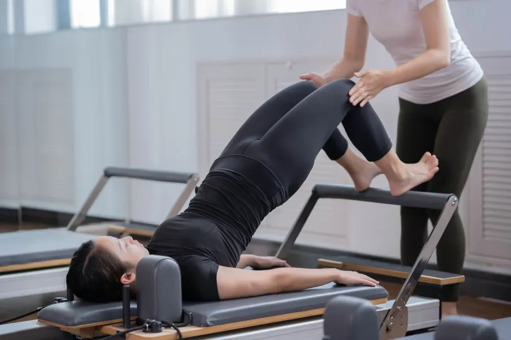 Facet Joint Injection in Plano, TX | Non-Surgical Options 4 Person doing guided physical therapy exercises to support back pain recovery after facet injection