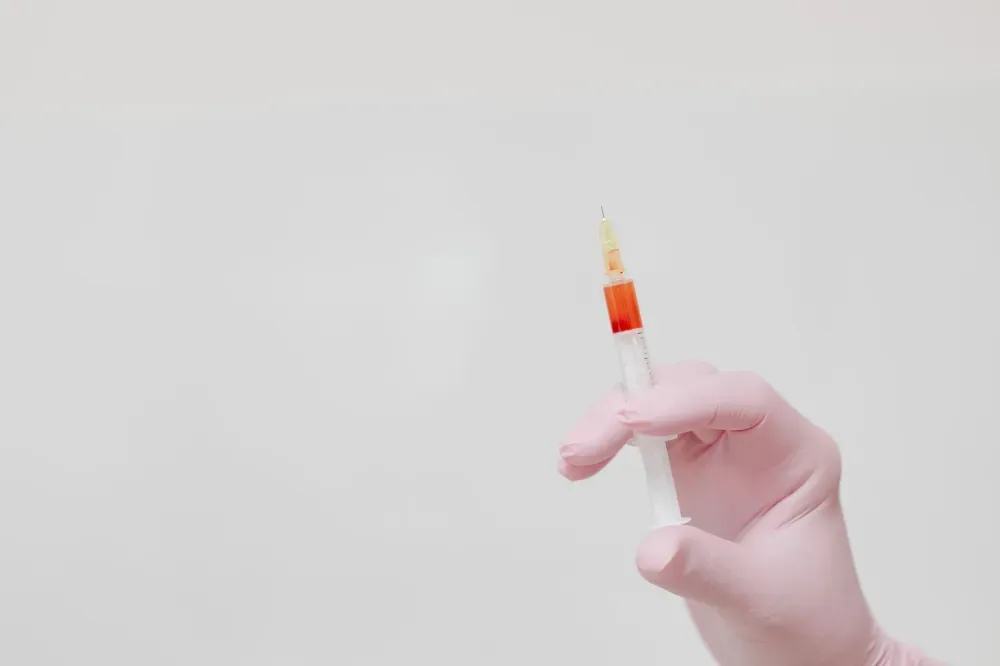 Facet Joint Injection in Tyler, TX | Non-Surgical Back Pain Care 2 Physician performing a fluoroscopy guided facet block injection for back pain