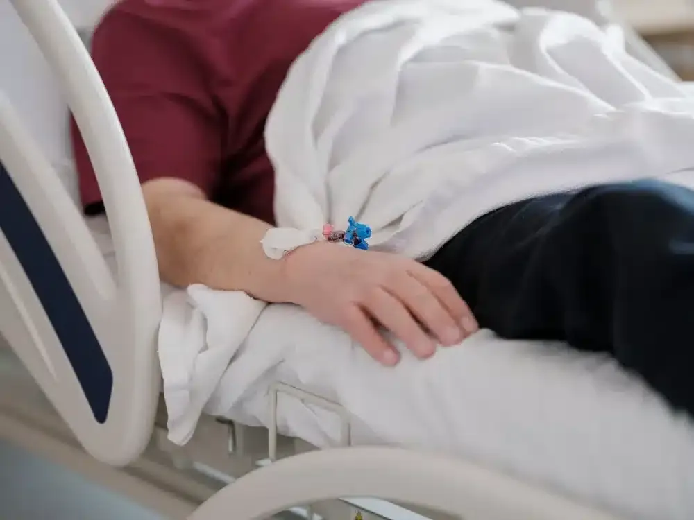 Facet Joint Injection in Tyler, TX | Non-Surgical Back Pain Care 3 Patient resting comfortably in a clinic recovery area after a facet joint injection