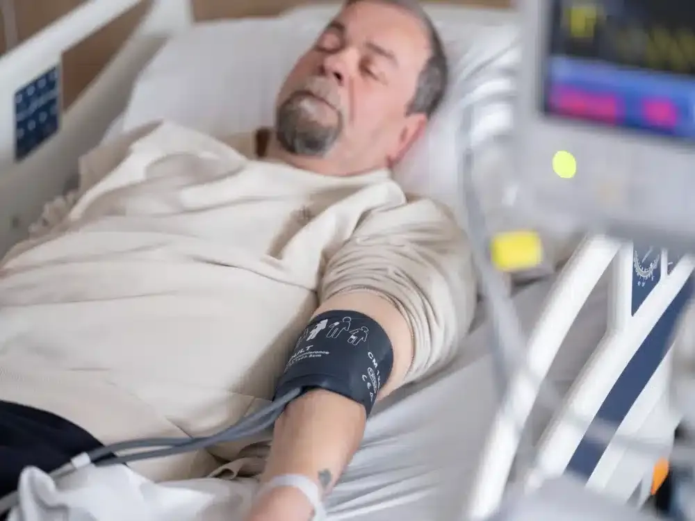 Intrathecal Pain Pump in Longview, TX | Same-Week Consults 3 Patient resting comfortably in recovery room after an outpatient pain management procedure