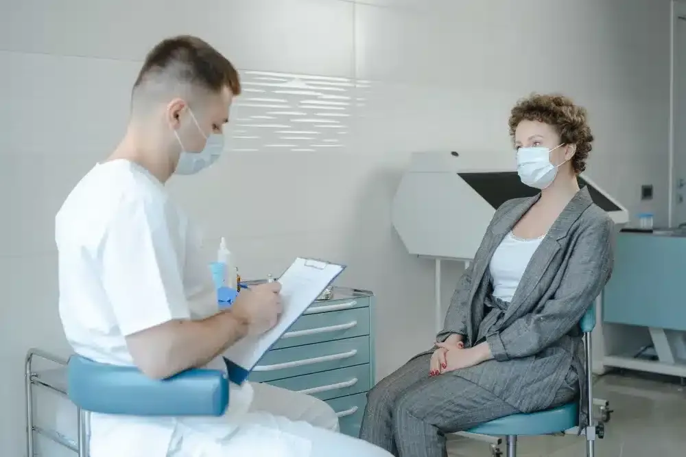 Intrathecal Pain Pump in Plano, TX | Same-Week Consults 1 Pain specialist consulting with a chronic pain patient at a Plano Texas clinic