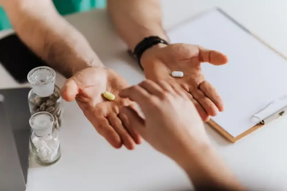 Medication Management in Plano, TX | Same-Week Consults 3 Pain management doctor discussing medication classes and dosing adjustments with a patient in Plano