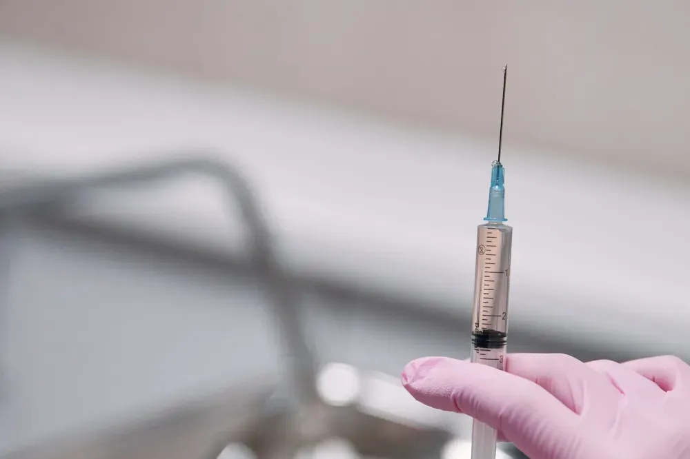 Occipital Nerve Block in Plano, TX | Same-Week Consults 2 Interventional pain specialist preparing an occipital nerve block injection in a clinic
