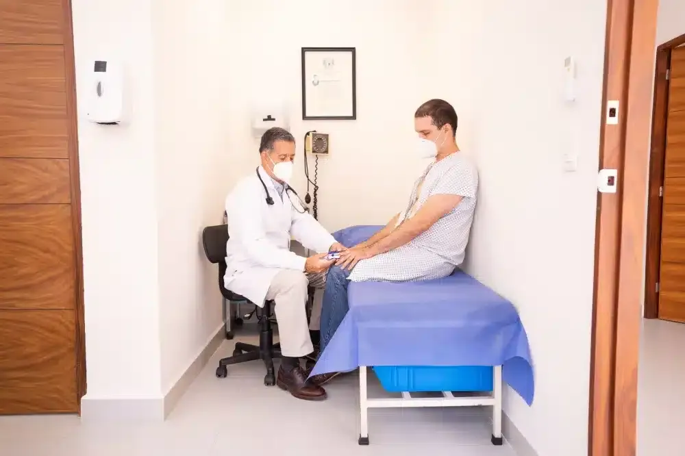 PRP Injection for Tendon Injuries in Tyler, TX | Non-Surgical Care 1 Pain management doctor consulting patient about tendon injury treatment options