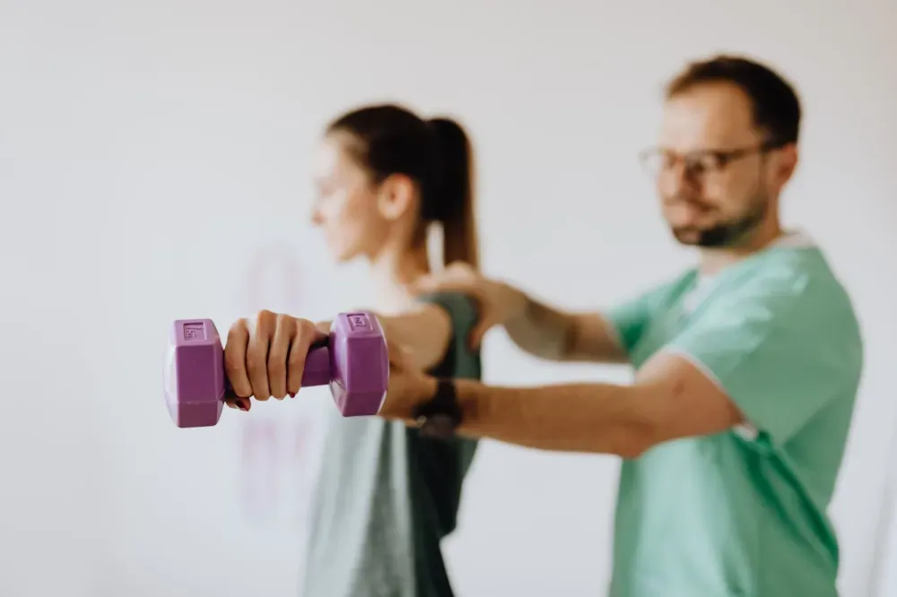 PRP Injection for Tendon Injuries in Tyler, TX | Non-Surgical Care 4 Patient doing physical therapy exercises for shoulder tendon injury recovery