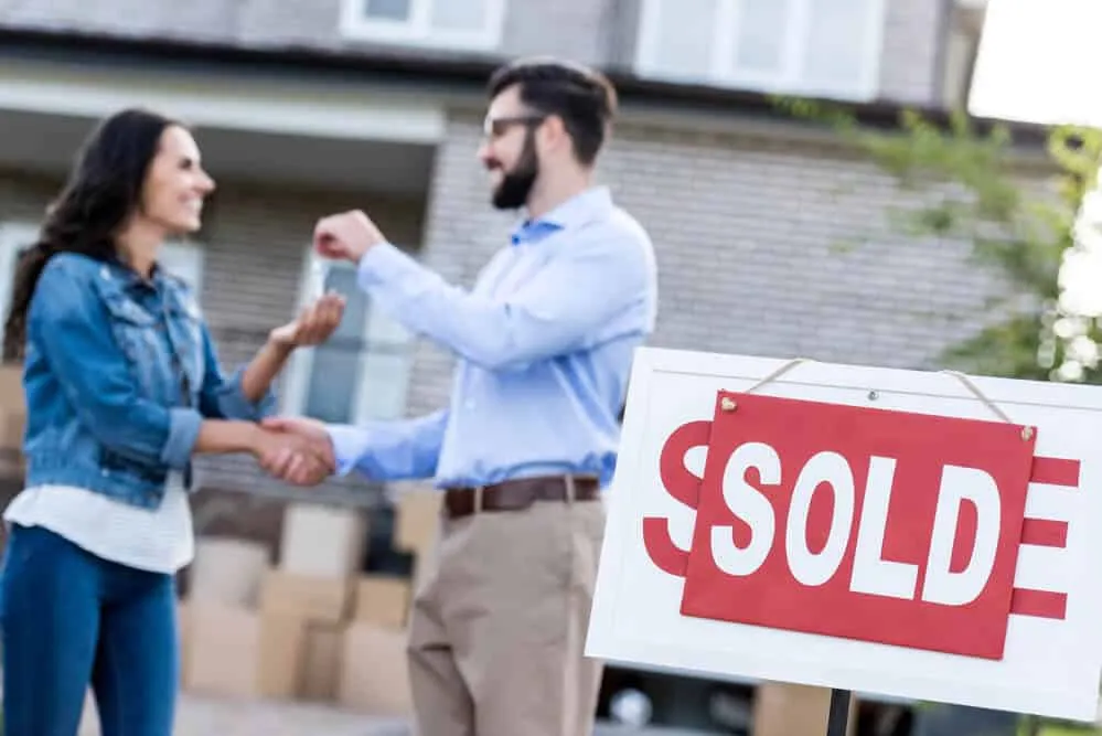 Woman buying new house-Sprint Funding