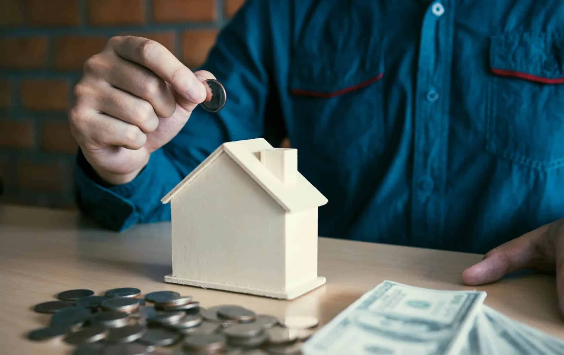Men are putting coins together with the idea of collecting money