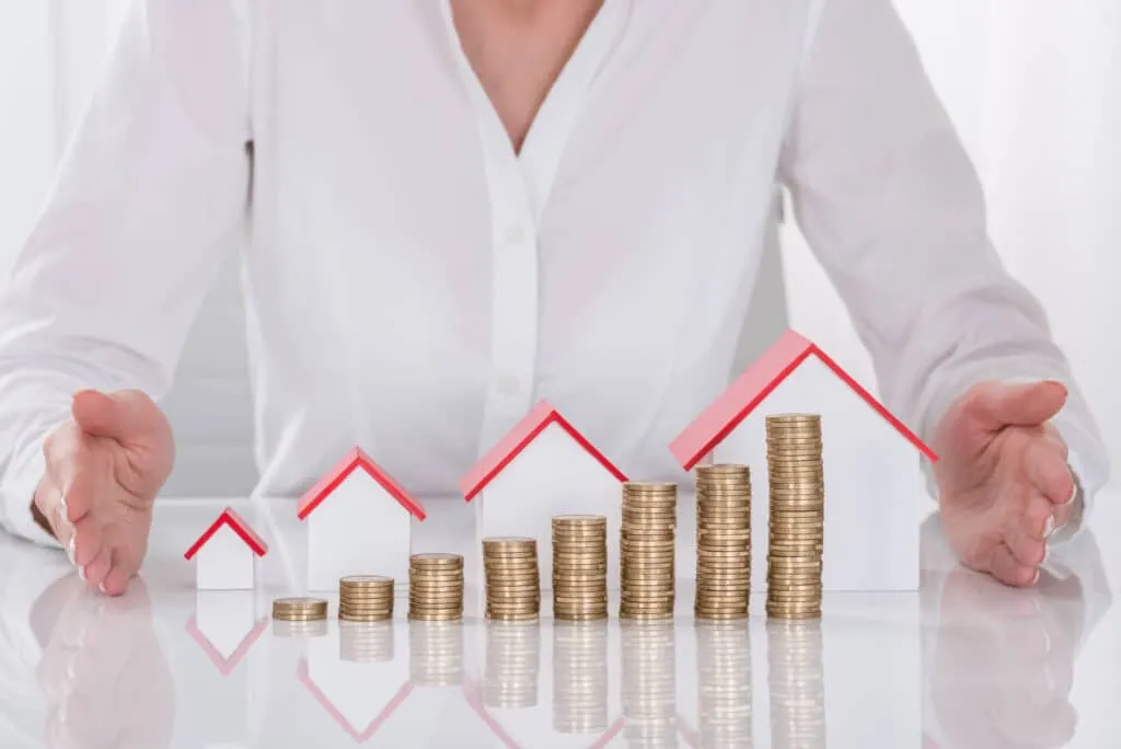women on white with safe investment real estate