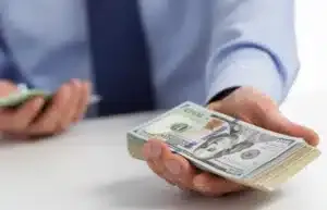 businessman holding money