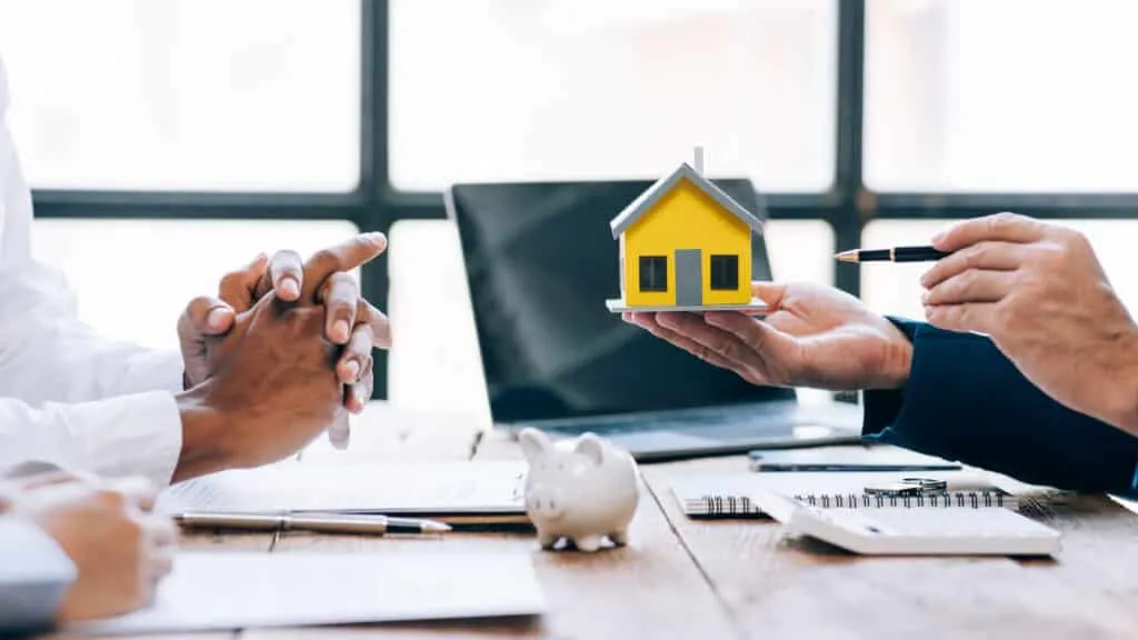 Close up Business people or Real Estate agent explain signing ag