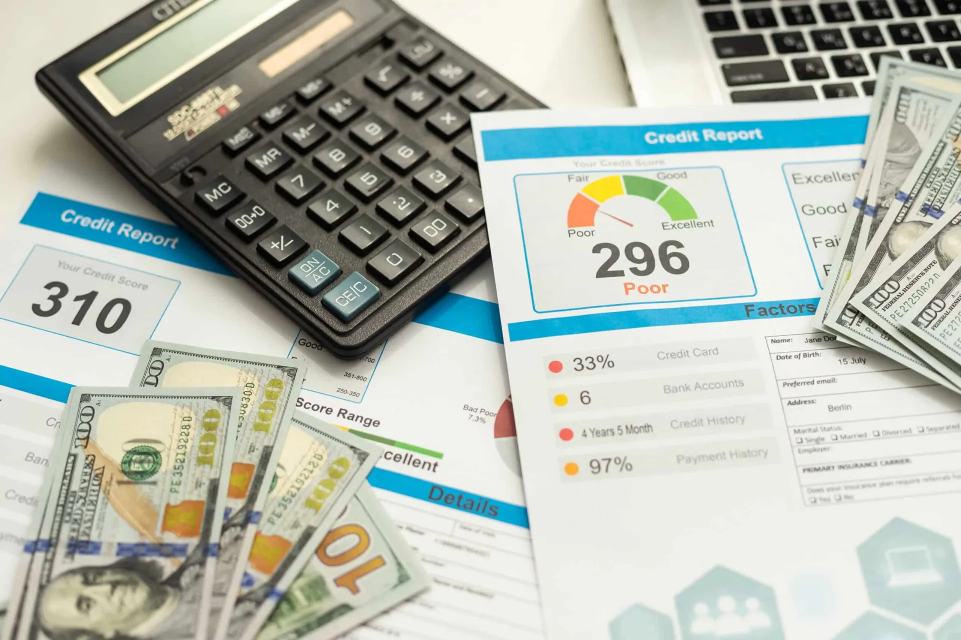 credit score report with pen and calculator
