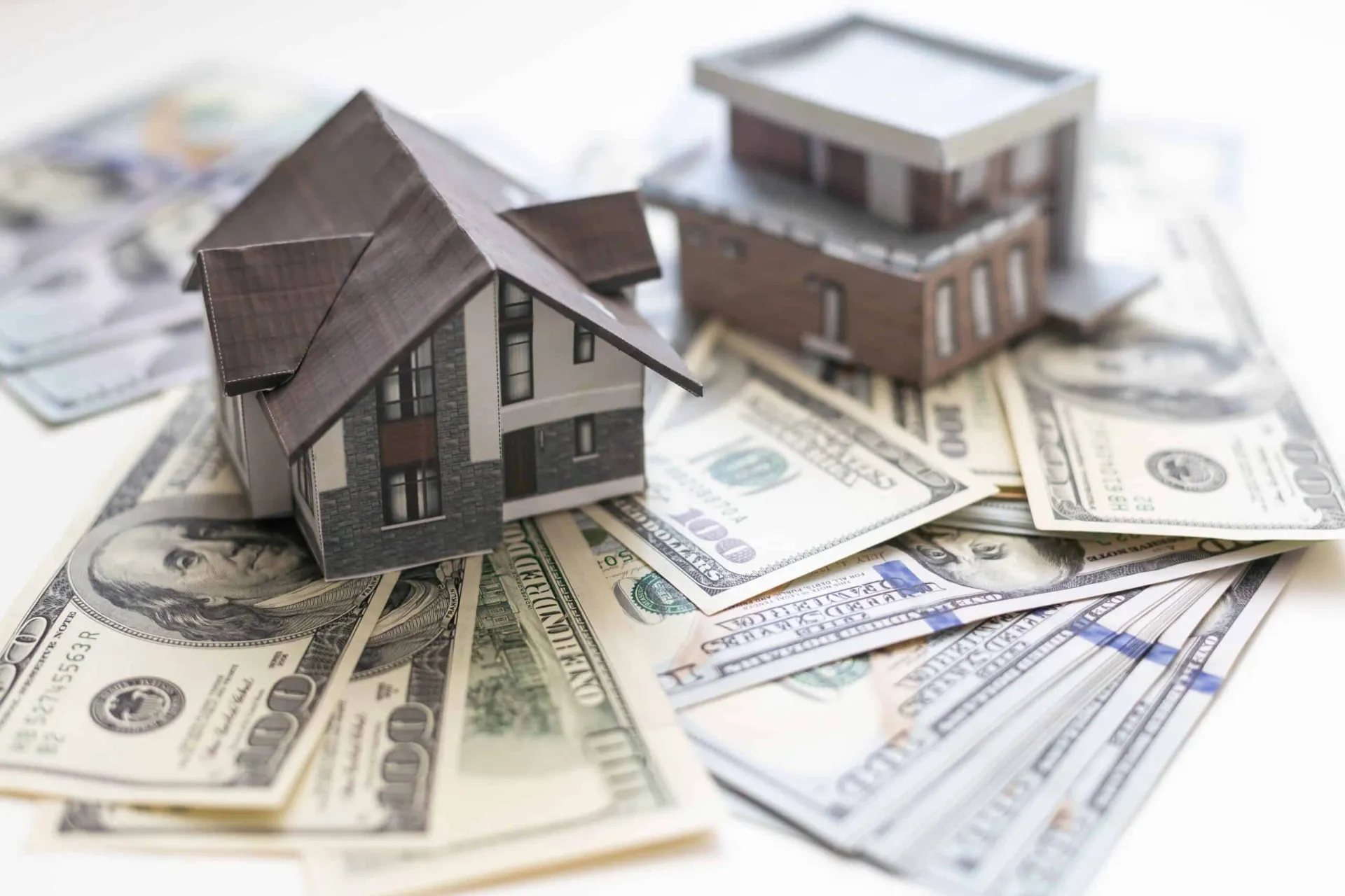 house model with money bills